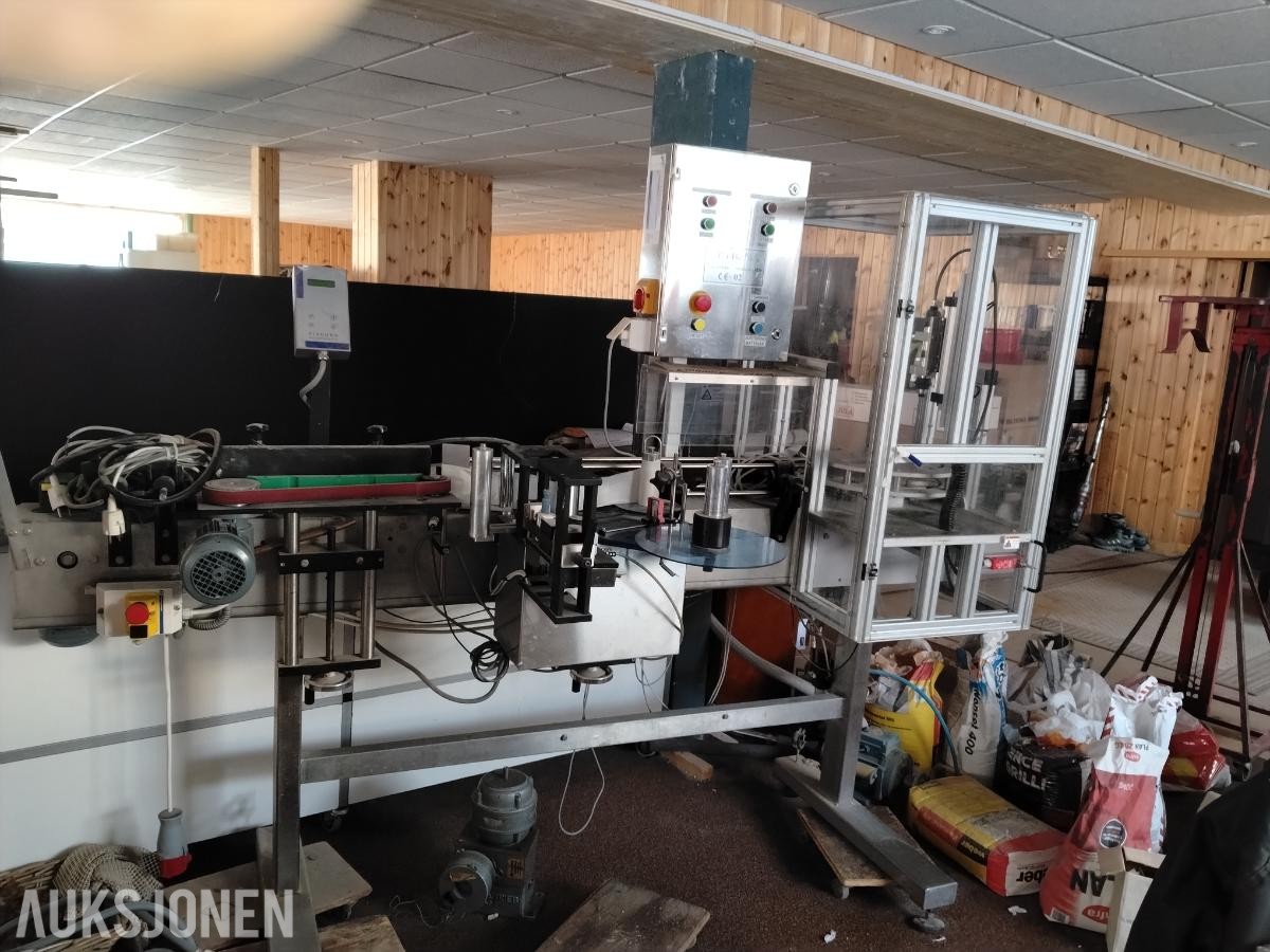 KORKE OG ETIKERINGSMASKIN LM - KS