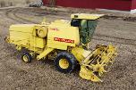 1983 New Holland 8040 Skurtresker – 12 fot skjærebord / halmkutter