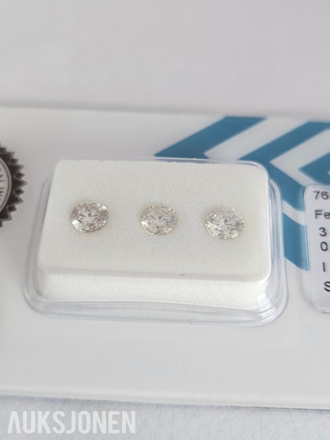 (IGI) 0.91CT 3 RUNDE NATURLIGE DIAMANTER.