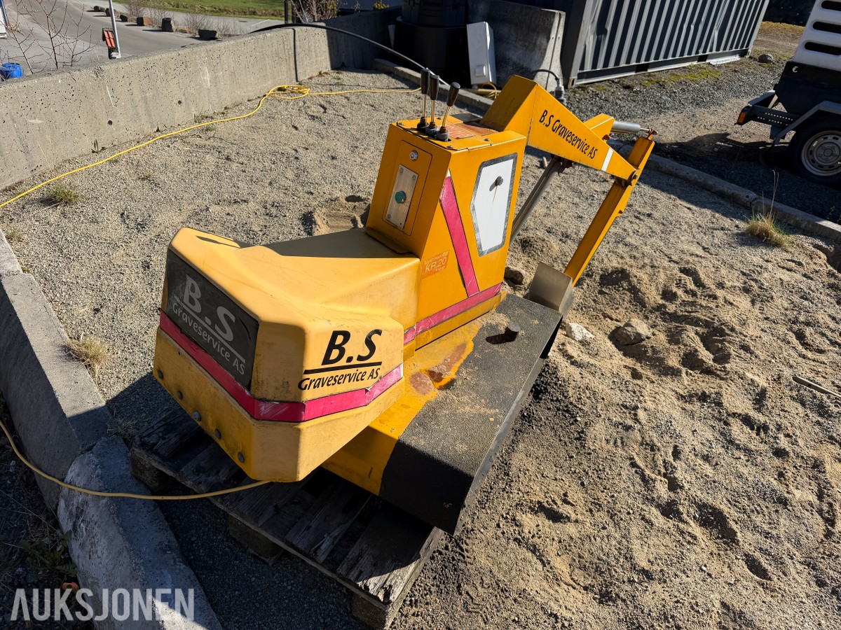 Elektrisk lekegraver til sandkasse