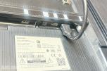 Samsung 65” TV med gulvstativ på hjul og fjernkontroll