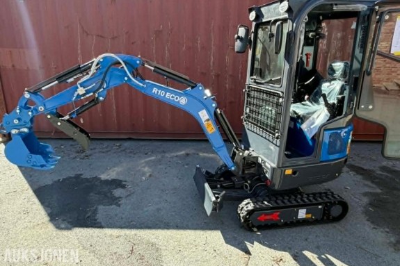 2026 Andre RX11.5 PRO+ - 1200KG GRAVER M/HYTTE OG VARME - JOYSTICK + BREDDBARE BELTER + BOMSVING + HYDR. TOMMEL - 72 timers auksjon