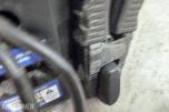 Parti med batteriladere, startbooster og startkabler