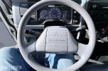 2010 Mitsubishi Fuso skapbil med løftelem og sidedør