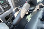 2010 Mitsubishi Fuso skapbil med løftelem og sidedør