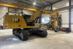 2023 Cat 330  2 kams belteplate