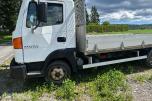 2002 Nissan Atleon Tippbil med 3-veisfunksjon
