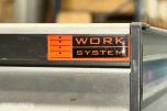 Work System bilinnredning med skuffeseksjoner og arbeidsbenk